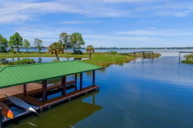 Luxurious lakeside living beckons you to your own private on Deer Island Country Club in Florida - for sale on GolfHomes.com, golf home, golf lot