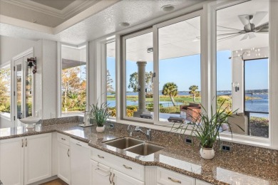 Luxurious lakeside living beckons you to your own private on Deer Island Country Club in Florida - for sale on GolfHomes.com, golf home, golf lot