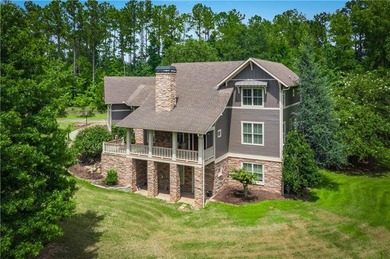 Welcome HOME to this elevated 6 bedroom, 4.5 bathroom chalet in on Coweta Club in Georgia - for sale on GolfHomes.com, golf home, golf lot