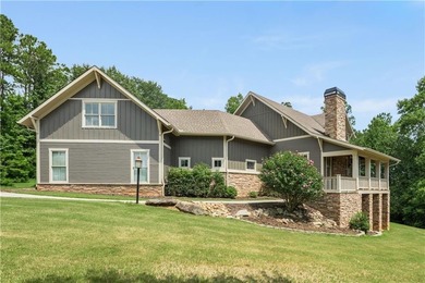 Welcome HOME to this elevated 6 bedroom, 4.5 bathroom chalet in on Coweta Club in Georgia - for sale on GolfHomes.com, golf home, golf lot