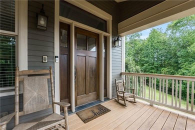 Welcome HOME to this elevated 6 bedroom, 4.5 bathroom chalet in on Coweta Club in Georgia - for sale on GolfHomes.com, golf home, golf lot