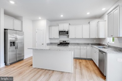 READY NOW!  END UNIT BAYLOR WITH DECK & 3RD BATHROOM!  Move in on Plantation Lakes Golf and Country Club in Delaware - for sale on GolfHomes.com, golf home, golf lot
