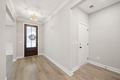 Welcome to this stunning 6-bedroom, 3.5-bathroom home in the on Legend Oaks Plantation Golf Club in South Carolina - for sale on GolfHomes.com, golf home, golf lot