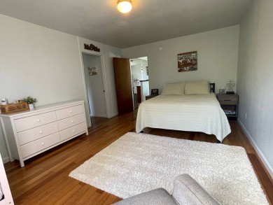 This beautiful home sits directly on the golf course in a quiet on Discovery Harbour Golf Course in Hawaii - for sale on GolfHomes.com, golf home, golf lot