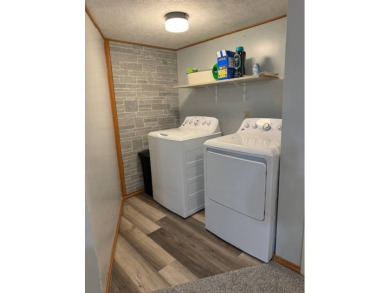 This Cozy home is located in a quiet neighborhood next to the on Poco Creek Golf Course (Aurora Country Club) in Nebraska - for sale on GolfHomes.com, golf home, golf lot