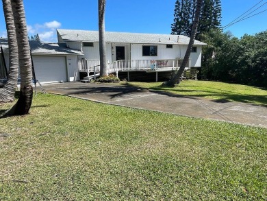 This beautiful home sits directly on the golf course in a quiet on Discovery Harbour Golf Course in Hawaii - for sale on GolfHomes.com, golf home, golf lot