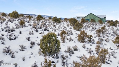 Perched high above Brush Creek Valley in Eagle Ranch's Highlands on Eagle Ranch in Colorado - for sale on GolfHomes.com, golf home, golf lot