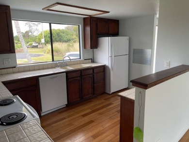 This beautiful home sits directly on the golf course in a quiet on Discovery Harbour Golf Course in Hawaii - for sale on GolfHomes.com, golf home, golf lot