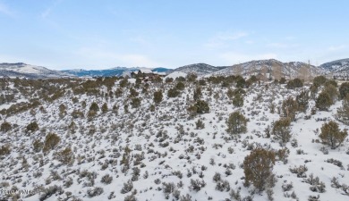 Perched high above Brush Creek Valley in Eagle Ranch's Highlands on Eagle Ranch in Colorado - for sale on GolfHomes.com, golf home, golf lot