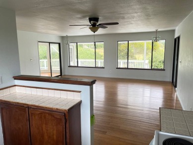 This beautiful home sits directly on the golf course in a quiet on Discovery Harbour Golf Course in Hawaii - for sale on GolfHomes.com, golf home, golf lot