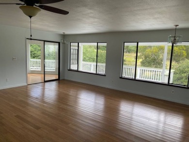 This beautiful home sits directly on the golf course in a quiet on Discovery Harbour Golf Course in Hawaii - for sale on GolfHomes.com, golf home, golf lot