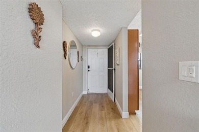 Beautifully updated Clearwater condo in the gated, resort-style on Cove Cay Country Club in Florida - for sale on GolfHomes.com, golf home, golf lot