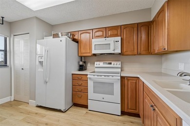 Beautifully updated Clearwater condo in the gated, resort-style on Cove Cay Country Club in Florida - for sale on GolfHomes.com, golf home, golf lot