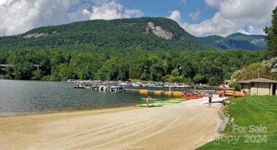 Welcome to a dream oasis nestled in serene beauty of Lake Lure! on Rumbling Bald Resort on Lake Lure in North Carolina - for sale on GolfHomes.com, golf home, golf lot