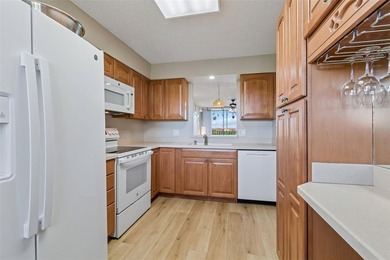 Beautifully updated Clearwater condo in the gated, resort-style on Cove Cay Country Club in Florida - for sale on GolfHomes.com, golf home, golf lot