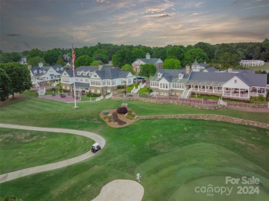 This Florida-style, hard stucco home is a beautiful ranch home on Trump National Golf Club Charlotte in North Carolina - for sale on GolfHomes.com, golf home, golf lot