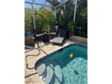 This is an amazing pool home nestled safely inside the gated 55+ on Sabal Springs Golf and Racquet Club in Florida - for sale on GolfHomes.com, golf home, golf lot