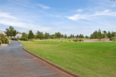 Experience tranquility and stunning golf course views from this on Aliante Golf Club in Nevada - for sale on GolfHomes.com, golf home, golf lot