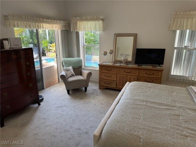 This is an amazing pool home nestled safely inside the gated 55+ on Sabal Springs Golf and Racquet Club in Florida - for sale on GolfHomes.com, golf home, golf lot