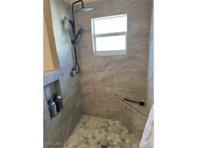 This is an amazing pool home nestled safely inside the gated 55+ on Sabal Springs Golf and Racquet Club in Florida - for sale on GolfHomes.com, golf home, golf lot