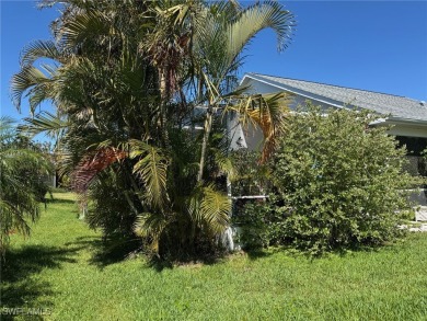 This is an amazing pool home nestled safely inside the gated 55+ on Sabal Springs Golf and Racquet Club in Florida - for sale on GolfHomes.com, golf home, golf lot