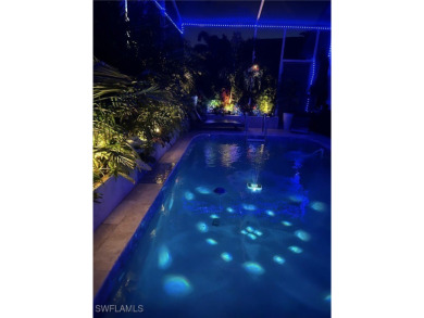 This is an amazing pool home nestled safely inside the gated 55+ on Sabal Springs Golf and Racquet Club in Florida - for sale on GolfHomes.com, golf home, golf lot