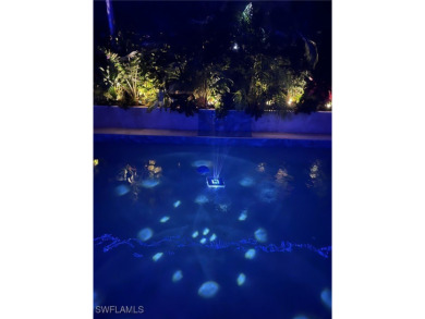 This is an amazing pool home nestled safely inside the gated 55+ on Sabal Springs Golf and Racquet Club in Florida - for sale on GolfHomes.com, golf home, golf lot