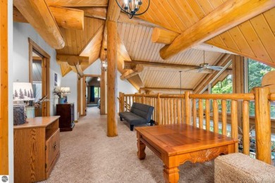 Welcome to this stunning Up North luxury log home perfectly on Boyne Mountain Resort - Monument Course in Michigan - for sale on GolfHomes.com, golf home, golf lot