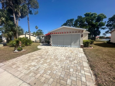 Lot Rent is $1342.00 monthly  Another showcase home in the on Del Tura Golf and Country Club in Florida - for sale on GolfHomes.com, golf home, golf lot