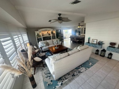 Lot Rent is $1342.00 monthly  Another showcase home in the on Del Tura Golf and Country Club in Florida - for sale on GolfHomes.com, golf home, golf lot