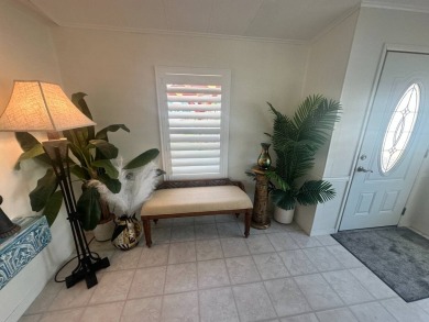 Lot Rent is $1342.00 monthly  Another showcase home in the on Del Tura Golf and Country Club in Florida - for sale on GolfHomes.com, golf home, golf lot