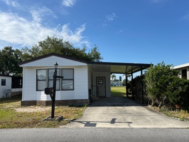 Charming 2-bedroom home in highly sought after Hidden Golf on Lake Henry Golf Club in Florida - for sale on GolfHomes.com, golf home, golf lot