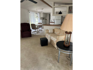 Charming 2-bedroom home in highly sought after Hidden Golf on Lake Henry Golf Club in Florida - for sale on GolfHomes.com, golf home, golf lot