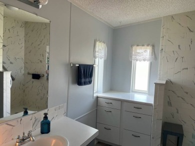 Beautifully Maintained Home offers an Inviting and Spacious on Four Lakes Golf Club in Florida - for sale on GolfHomes.com, golf home, golf lot