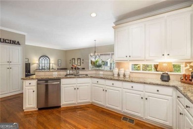 Nestled on a quiet cul-de-sac in the heart of Windward, this on The Golf Club of Georgia in Georgia - for sale on GolfHomes.com, golf home, golf lot