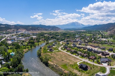 Beautiful, flat lot situated the Roaring Fork River with on Ironbridge Golf Club in Colorado - for sale on GolfHomes.com, golf home, golf lot