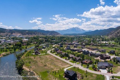 Beautiful, flat lot situated the Roaring Fork River with on Ironbridge Golf Club in Colorado - for sale on GolfHomes.com, golf home, golf lot
