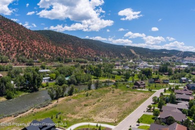 Beautiful, flat lot situated the Roaring Fork River with on Ironbridge Golf Club in Colorado - for sale on GolfHomes.com, golf home, golf lot