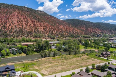 Beautiful, flat lot situated the Roaring Fork River with on Ironbridge Golf Club in Colorado - for sale on GolfHomes.com, golf home, golf lot