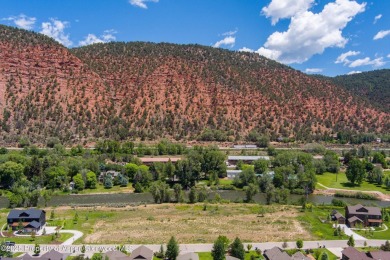 Beautiful, flat lot situated the Roaring Fork River with on Ironbridge Golf Club in Colorado - for sale on GolfHomes.com, golf home, golf lot