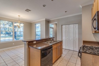 Spacious and airy End Unit Townhome with first floor Primary on Southwood Golf Club in Florida - for sale on GolfHomes.com, golf home, golf lot