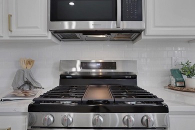 Welcome to this beautifully updated 4-bedroom, 2.5-bath home in on Canongate At Olde Atlanta Golf Club in Georgia - for sale on GolfHomes.com, golf home, golf lot