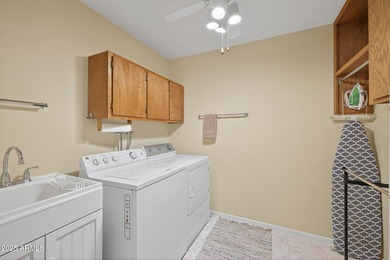 Beautifully designed custom home featuring a bright and open on Sunland Village East Golf Course in Arizona - for sale on GolfHomes.com, golf home, golf lot