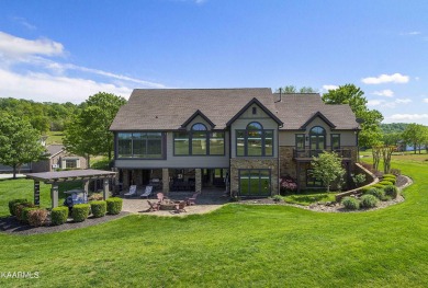 This stunning custom home sits on a double lot and overlooks the on Tennessee National Golf Club in Tennessee - for sale on GolfHomes.com, golf home, golf lot