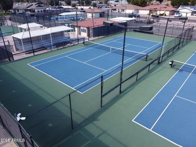 Beautifully designed custom home featuring a bright and open on Sunland Village East Golf Course in Arizona - for sale on GolfHomes.com, golf home, golf lot
