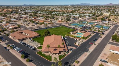 Beautifully designed custom home featuring a bright and open on Sunland Village East Golf Course in Arizona - for sale on GolfHomes.com, golf home, golf lot