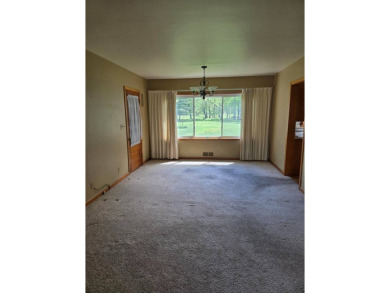 Discover charm and comfort in this 2 bedroom, 1 bath ranch style on Quail Creek Country Club in Illinois - for sale on GolfHomes.com, golf home, golf lot