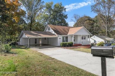 This 4-bedroom, 3-bath home is located in a quiet North on Whittle Springs Golf Course in Tennessee - for sale on GolfHomes.com, golf home, golf lot