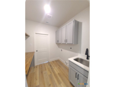 Spacious 4-Bedroom Home with 3-Car Garage in Prime Belton on Leon Valley Golf Course in Texas - for sale on GolfHomes.com, golf home, golf lot