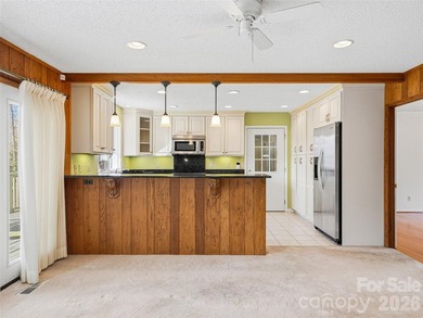 Tucked along the fairways of the Country Club of Asheville, this on  in North Carolina - for sale on GolfHomes.com, golf home, golf lot